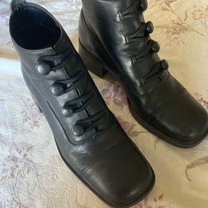 Vintage black leather witchy boots